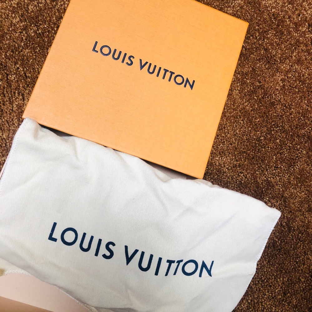 Authentic LV Wristlet, brand new, in box.